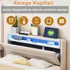 A bed with a headboard featuring storage and LED lighting, showcasing various items that can be placed on it. Anteprima dell’immagine prodotto