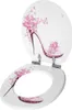 An open toilet seat and lid with a floral high-heeled shoe design. Náhled obrázku produktu