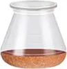 A conical glass beaker with a brown granular substance at the bottom, filled with a small amount of liquid. Produktbild-Vorschau