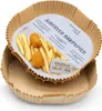 A product shot of air fryer baking paper liners with french fries and chicken nuggets inside one liner, with another liner shown below. Anteprima dell’immagine prodotto