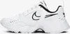 A side view of a white Nike Air Heights women's sports shoe with black accents. Voir les images du produit