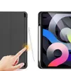 A hand is shown interacting with a tablet case, next to a tablet with a stylus attached. Produktbild-Vorschau