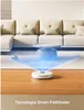 A white robotic vacuum cleaner is shown on a wooden floor in front of a couch, with a blue light projection simulating navigation. Voir les images du produit