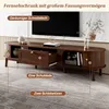 A modern wooden TV stand with drawers and sliding doors, placed in a living room setting. Podgląd zdjęcia produktu