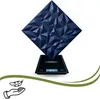 A 3D wall panel is placed on a digital scale, showing its weight. Podgląd zdjęcia produktu