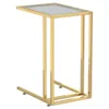 A C-shaped side table with a glass top and a gold metal frame. Podgląd zdjęcia produktu