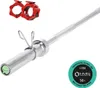 A close-up shot of a barbell and weight collars, with a product information badge. Podgląd zdjęcia produktu