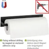 A black paper towel holder with a roll of paper towels attached, shown on a white background. There are icons and text indicating features. Anteprima dell’immagine prodotto