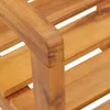 A close-up view of the armrest and slats of a wooden chair. Anteprima dell’immagine prodotto