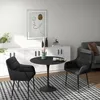 A modern living room scene with a small dining set and a sofa. Podgląd zdjęcia produktu