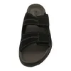 A top-down view of a black sandal with two adjustable straps. Anteprima dell’immagine prodotto