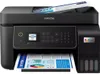 A black Epson EcoTank L5310 printer is shown from the front, with a document in the output tray and another document in the input tray. Produktbild-Vorschau