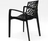 A black chair with a patterned back and armrests, shown from a side-angle against a white background. Produktbild-Vorschau