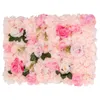 A wall decoration made of artificial flowers in various shades of pink and white. Podgląd zdjęcia produktu