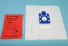 A red instruction leaflet and a white vacuum cleaner bag are laid out on a light blue background. Produktbild-Vorschau