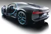A black Bugatti Chiron model car with blue accents, shown from a rear-quarter angle on a reflective surface. Voir les images du produit