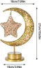 A gold-colored decorative lamp shaped like a crescent moon with a hanging star, with dimensions indicated by text overlays. Produktbild-Vorschau