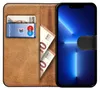 A book-style phone case for an iPhone 13 Pro Max, open to reveal card slots and cash. Anteprima dell’immagine prodotto