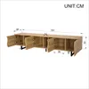 A diagram of a TV stand with dimensions indicated. Voir les images du produit
