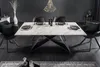A modern dining room with a marble-effect table and chairs. Produktbild-Vorschau