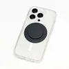A clear shot of the back of a smartphone case with a PopGrip attached. Náhled obrázku produktu