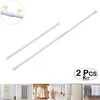 A collage of images showing extendable curtain rods and examples of their use. Produktbild-Vorschau