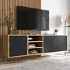 A modern TV cabinet with a wall-mounted television above it, set against a slatted wooden wall. Produktbild-Vorschau