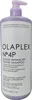 A bottle of Olaplex Nº4P Blonde Enhancer Toning Shampoo. Produktbild-Vorschau