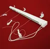 A white roller blind mechanism with cords and mounting brackets is laid out on a red background. Produktbild-Vorschau