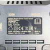 A close-up view of a label on a Bosch power tool charger, showing product information and certifications. Voir les images du produit