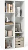 A white bookshelf filled with various decorative items and books. Podgląd zdjęcia produktu