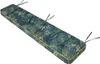 A long, tufted bench cushion with a tropical leaf pattern and yellow piping, shown from a diagonal angle against a white background. Náhled obrázku produktu
