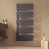 A modern bathroom with a dark gray towel radiator mounted on a light brown wall. Náhľad obrázku produktu