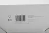 A close-up view of the side of a white cardboard box, showing text, a barcode, and regulatory symbols. Produktbild-Vorschau