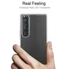 A hand holding a transparent phone case on a white background. Produktbild-Vorschau