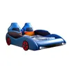 A blue car-shaped children's bed with two headrests and pillows on a white background. Anteprima dell’immagine prodotto