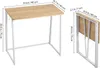 A diagram showing a foldable desk in its open and folded states with dimensions indicated. Podgląd zdjęcia produktu