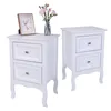 Two white nightstands are displayed against a white background. One nightstand has a framed picture and a vase of flowers on top. Produktbild-Vorschau