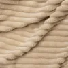 A close-up view of a textured beige fabric with horizontal ribbed lines. Anteprima dell’immagine prodotto