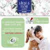 A woman hugging a dog, with marketing text and graphics about a pet product. Produktbild-Vorschau