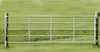 A metal farm gate is shown in a grassy field. Produktbild-Vorschau