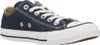 A single navy blue Converse Chuck Taylor All Star low-top sneaker is shown from a side angle against a white background. Náhled obrázku produktu