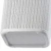 A close-up view of the bottom of a white woven laundry basket. Produktbild-Vorschau