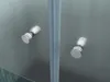 Close-up of two silver shower door handles on a frosted glass shower door. Produktbild-Vorschau