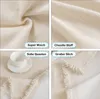 A collage of four close-up images showing different aspects of a cream-colored fabric product, likely a blanket or sofa cover, with text overlays describing its features. Produktbild-Vorschau