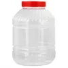 A clear, studio shot of a large, empty, transparent plastic storage container with a red screw-on lid, presented against a plain white background. Podgląd zdjęcia produktu