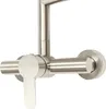 A close-up studio shot of a silver faucet. Podgląd zdjęcia produktu