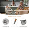 A family is having breakfast at a table, with a baby in a high chair. Anteprima dell’immagine prodotto