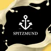 A black background with splashes of a creamy liquid and a logo in the center. Produktbild-Vorschau