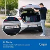 A man is loading luggage into the trunk of a car. A close-up of the car's license plate is shown. Podgląd zdjęcia produktu